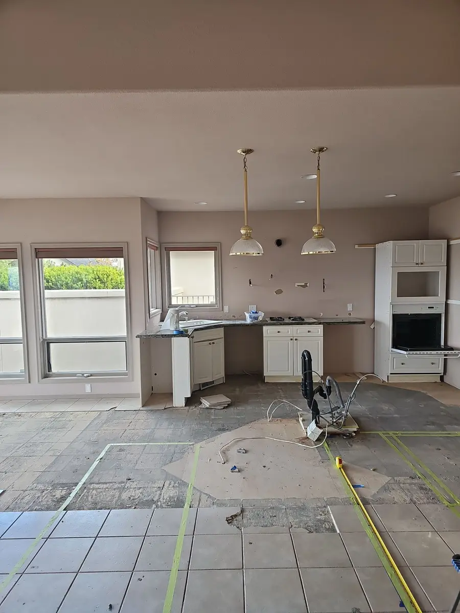 Kitchen space during renovation before the finished electrical and lighting details.
